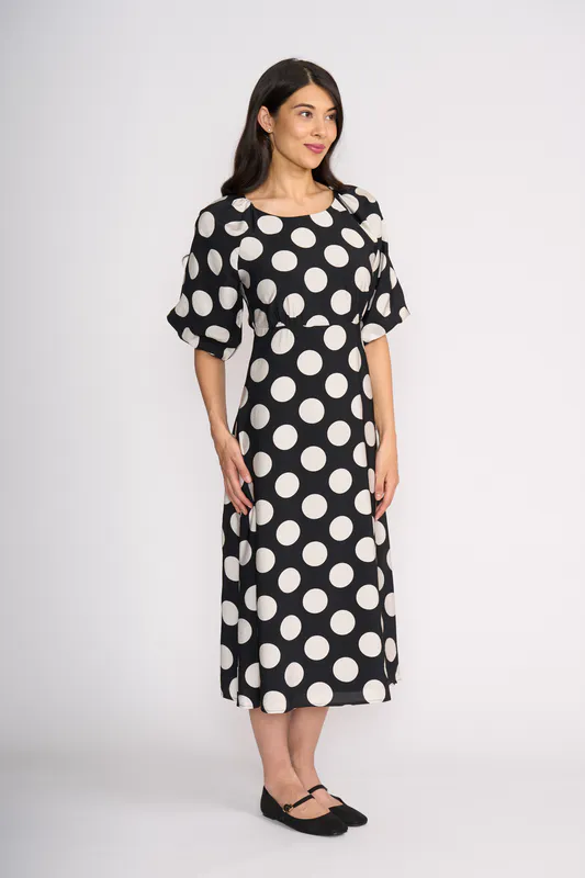 Model wearing Spot Raglan Sleeve Maxi Dress By Oh Three Available at Beetees Nelson
