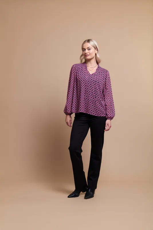 Model wearing Perwinkle Mosaic Coloured Blouse - Shirred Yoke By Memo Available at Beetees Nelson