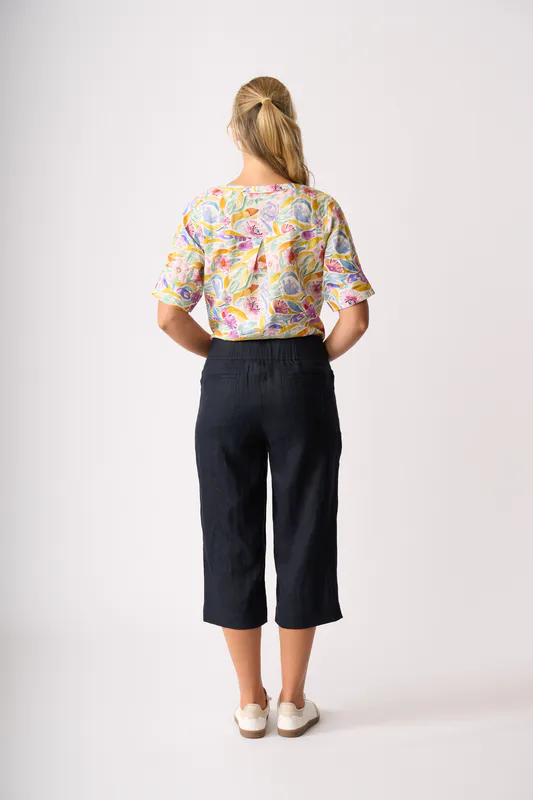 Model wearing Bright Blooms Pleat Back Top By Foil Available at Beetees Nelson