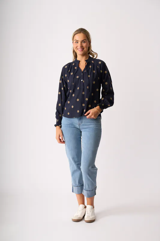Model wearing Navy Spot Just Chillin' Top By Oh Three Available at Beetees Nelson