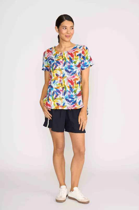 Model wearing Mist Floral Top - Swing, Up Down Hem By Preen Available at Beetees Nelson