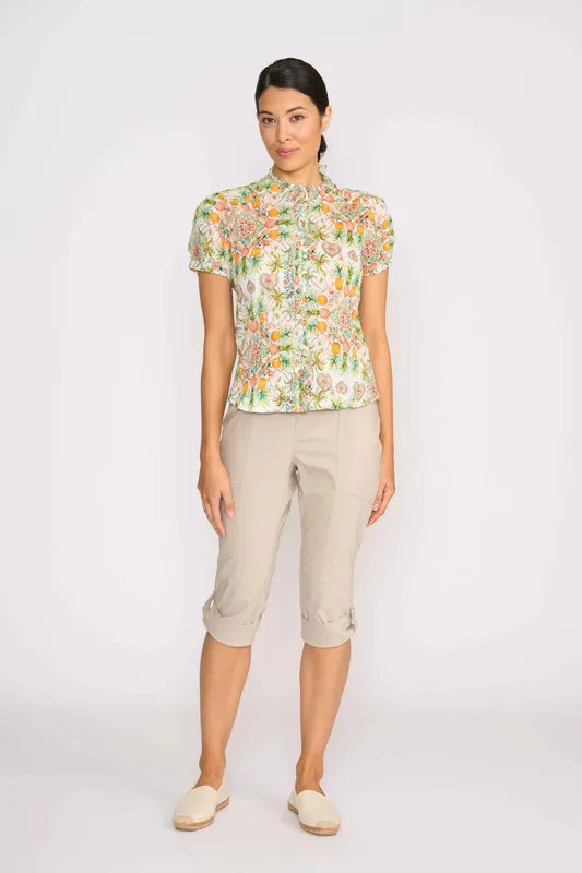 Model wearing Tutti Fruti Ultimate Crush Cap Sleeve Shirt By Foil Available at Beetees Nelson