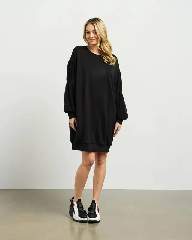 Model wearing Mia Sweater Dress By Et Alia Available at Beetees Nelson