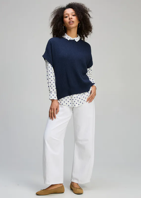 Model wearing Dark Denim Sleeveless Crew Essential By Zaket & Plover Available at Beetees Nelson