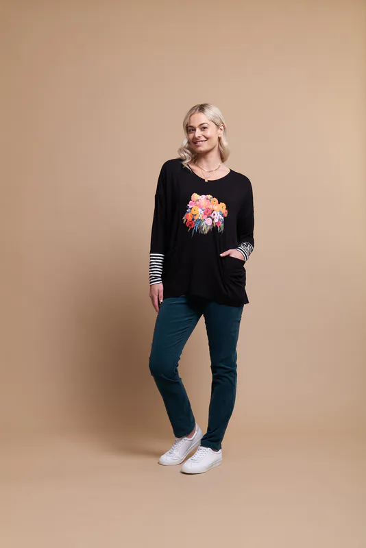 Model wearing Floral Bouquet Coloured Top - Blocked Stripe By Foil Available at Beetees Nelson