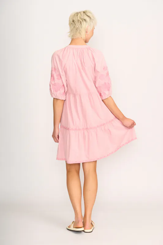 Model wearing Pink Embroidered Tiered Dress By Foil Available at Beetees Nelson