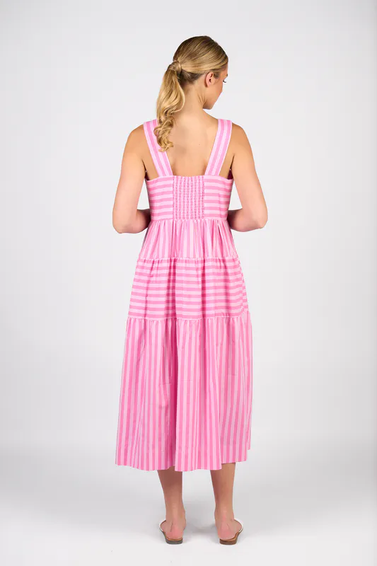 Model wearing Pink Stripe Sleeveless Tiered Dress with Wide Straps By Vassalli Available at Beetees Nelson