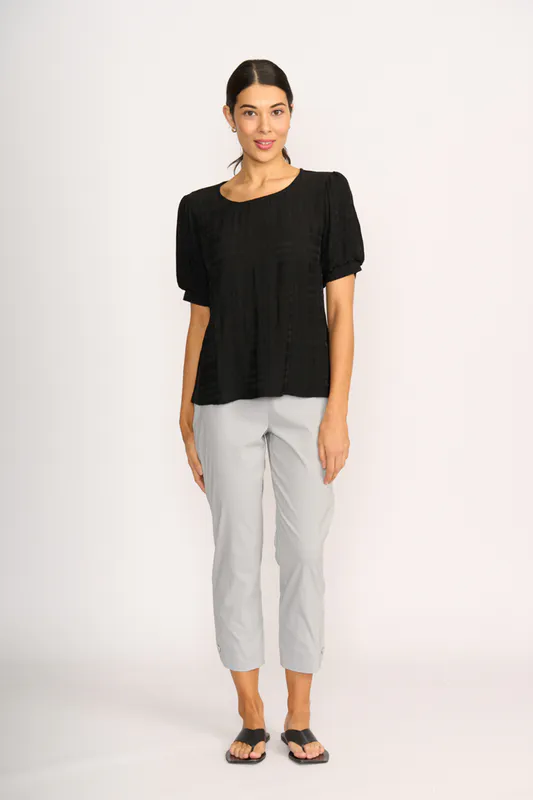 Model wearing Black Top - Volume Sleeve, Scoop Hem By OH Three Available at Beetees Nelson