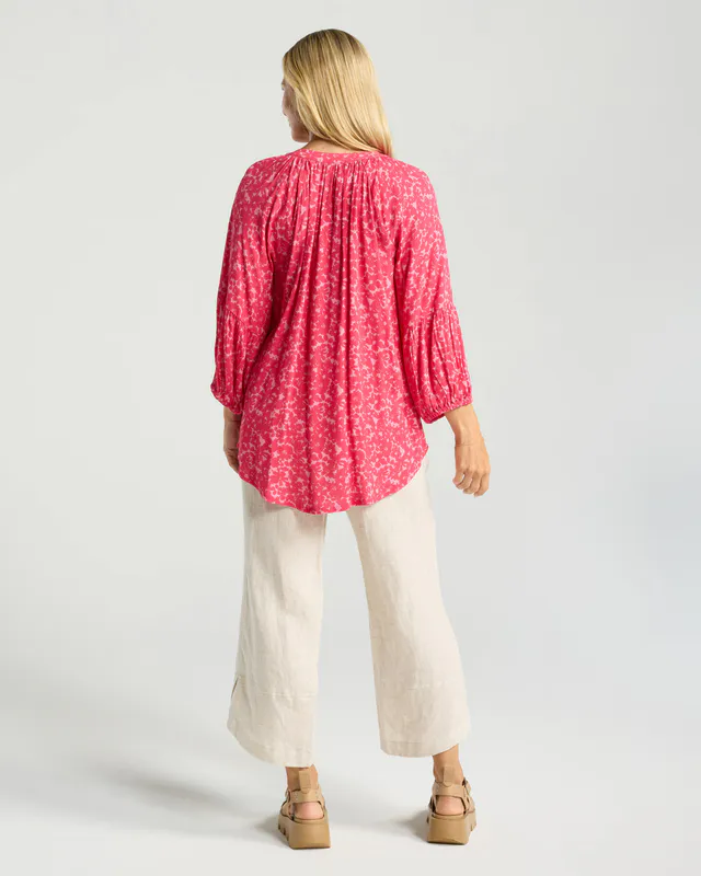 Model wearing Secret Garden Rose Sorbet Monica Gathered Sleeve Top By Blackstone Available at Beetees Nelson