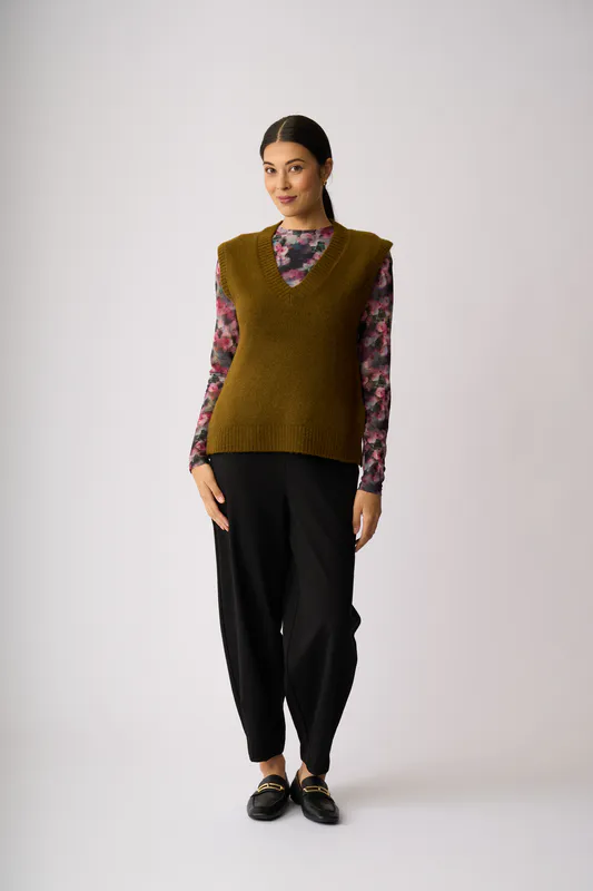 Model wearing Chatreuse Pop Star Vest By Memo Available at Beetees Nelson