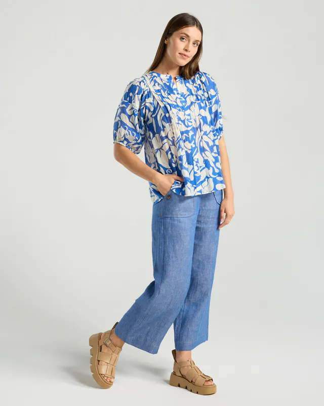 Model wearing Blue Ivory Floral Bridget Pintuck Top By Blackstone Available at Beetees Nelson