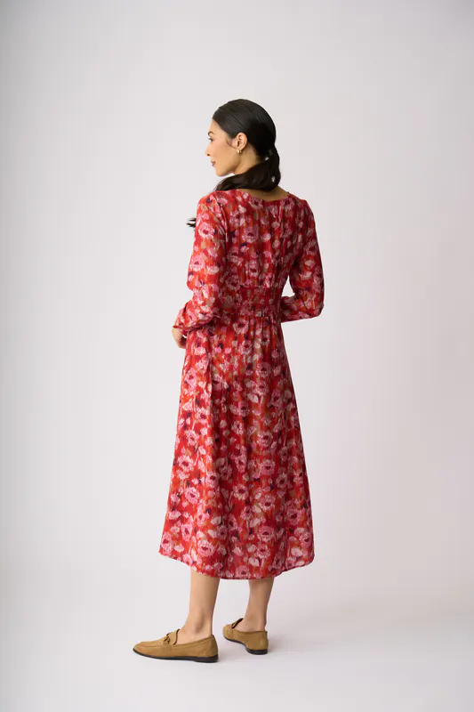 Model wearing Winter Blooms Pleats Please Dress By Preen Available at Beetees Nelson