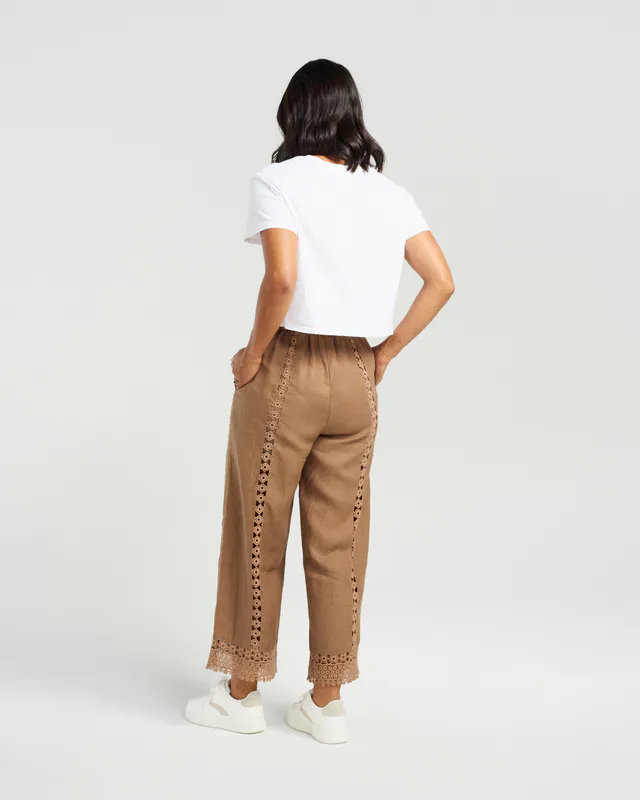 Model wearing Brown Flynn Pant By NMBR Rose Available at Beetees Nelson
