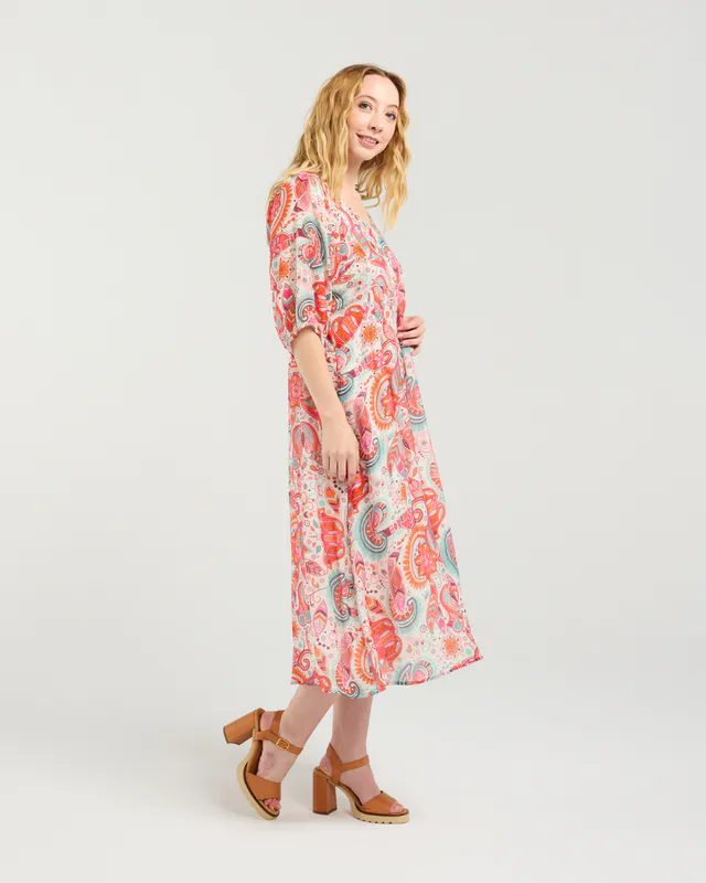 Model wearing Summer Foliage Linda Dress By Seduce Available at Beetees Nelson