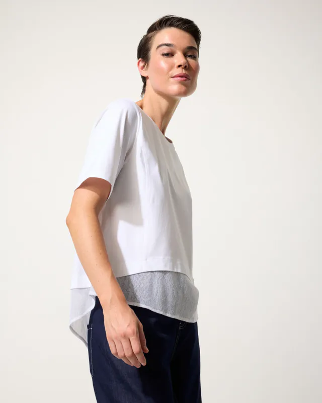 Model wearing White Mesh Panelled Tee By Marco Polo Available at Beetees Nelson