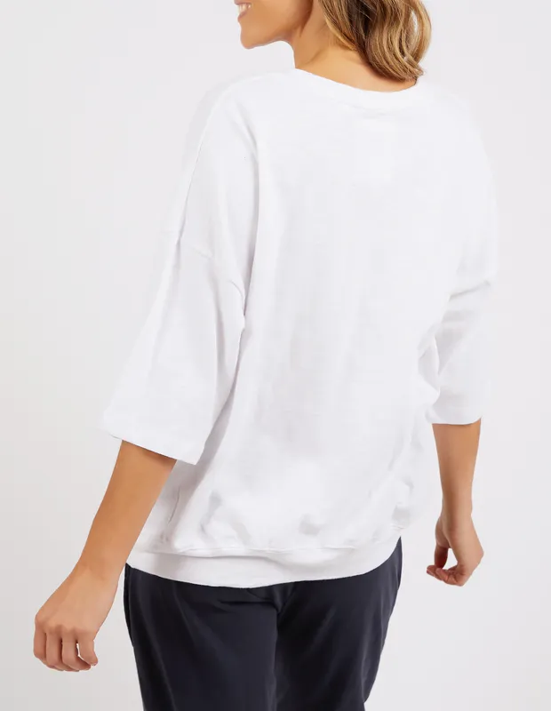 Model wearing White Mazie Sweat By Elm Available at Beetees Nelson