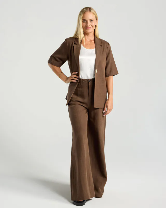Model wearing Chocolate Francesca Linen Blazer By Blackstone Available at Beetees Nelson