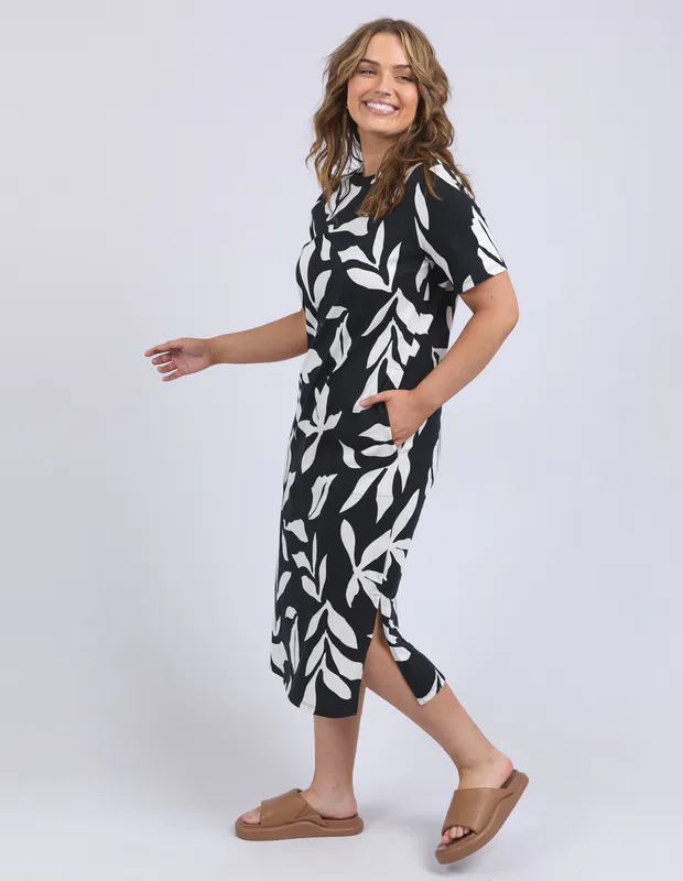 Model wearing Black Mimosa Tee Dress By Elm Available at Beetees Nelson