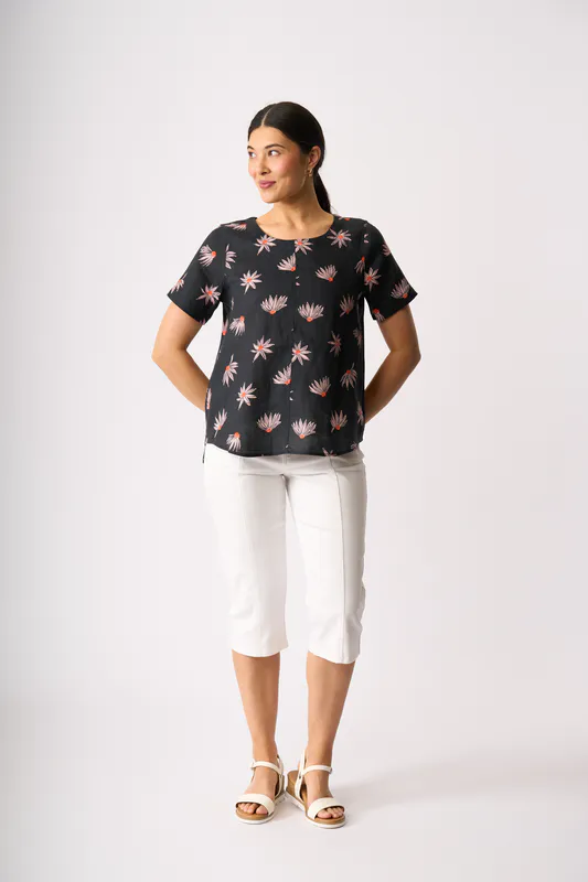 Model wearing In Flower Top - Swing, Up Down Hem By Preen Available at Beetees Nelson
