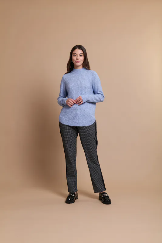 Model wearing Powder Coloured Jumper - Scoop Hem, Contrasts By Foil Available at Beetees Nelson
