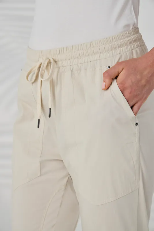 Model wearing Almond LTL Port 7/8 Pant By Lania Available at Beetees Nelson