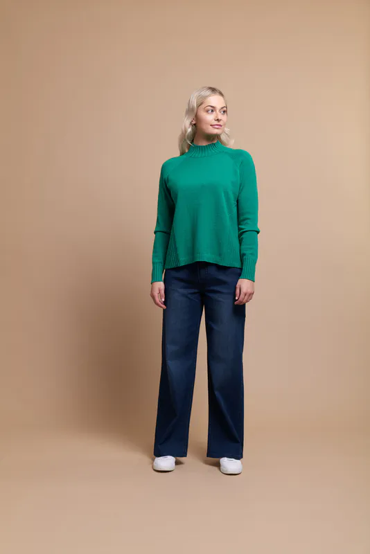 Model wearing Clover Coloured Jumper- Cropped, Turtle Neck By Memo Available at Beetees Nelson