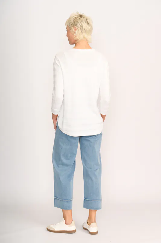 Model wearing White Jumper - Stripe Scoop By Foil Available at Beetees Nelson
