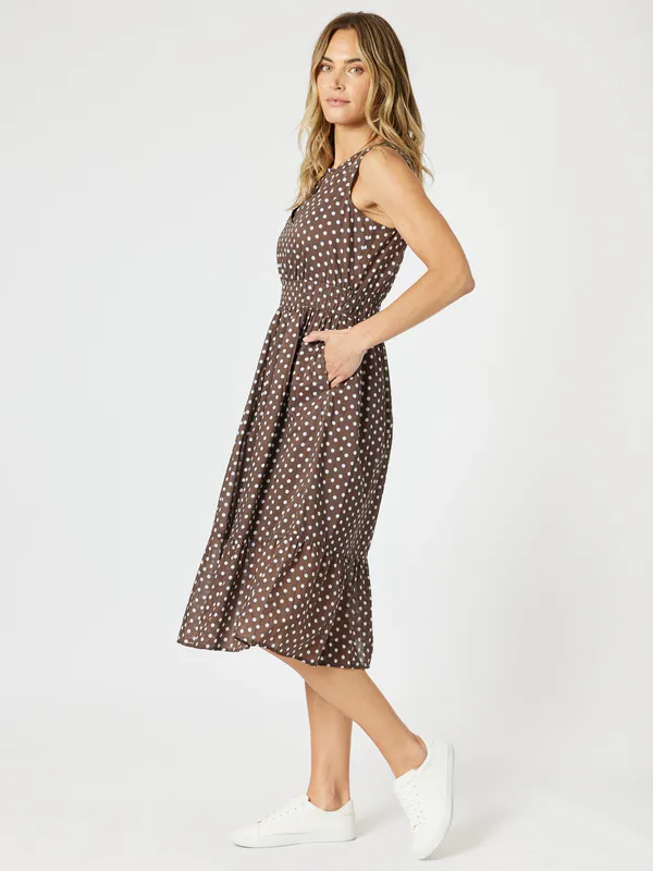 Model wearing Koko White Get Spotty Dress By Gordon Smith Available at Beetees Nelson