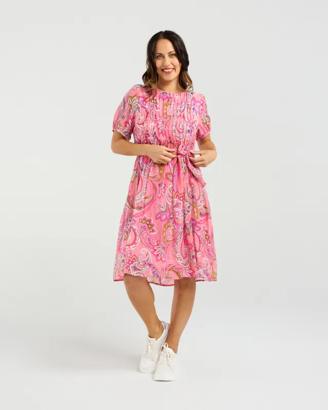 Model wearing Whimsy Swiri Joana Dress By Seduce Available at Beetees Nelson