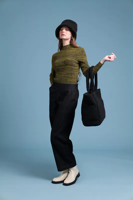 Model wearing Ginseng/Black Coloured  Marle & Me Turtleneck Available at Beetees Nelson