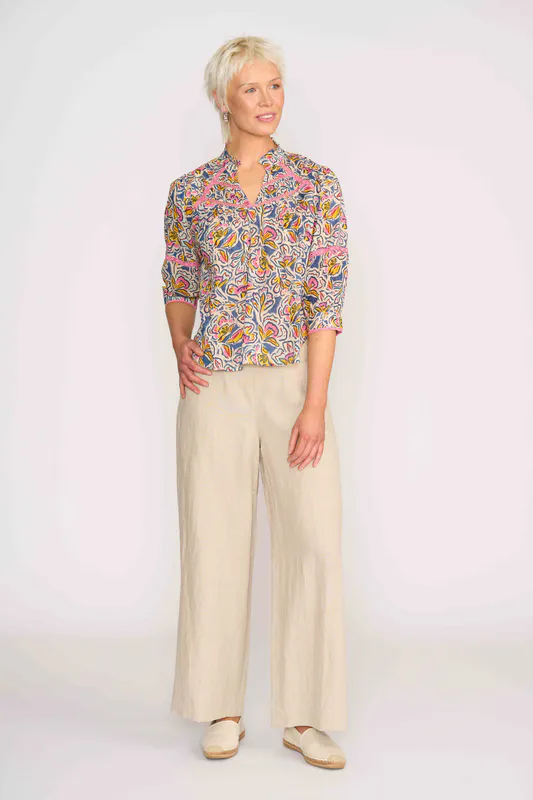 Model wearing Denim Floral Trim Insert Blouse By Foil Available at Beetees Nelson