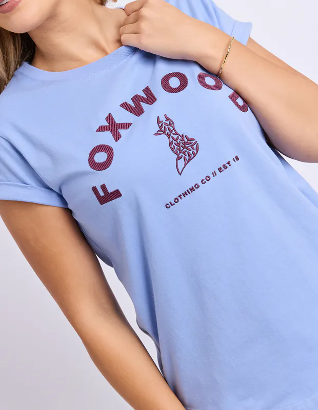 Model wearing Cornflower Blue Effortless Contrast Tee By Foxwood Available at Beetees Nelson