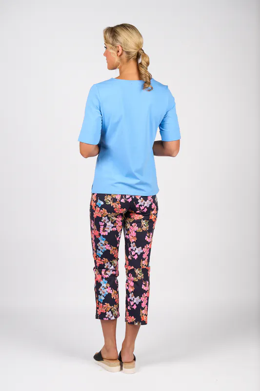 Model wearing Sky V Neck Top By Vassalli Available at Beetees Nelson