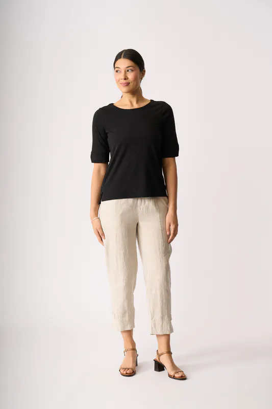 Model wearing Black Tee - Wide Neck, Elbow Sleeve By Esplanade Available at Beetees Nelson