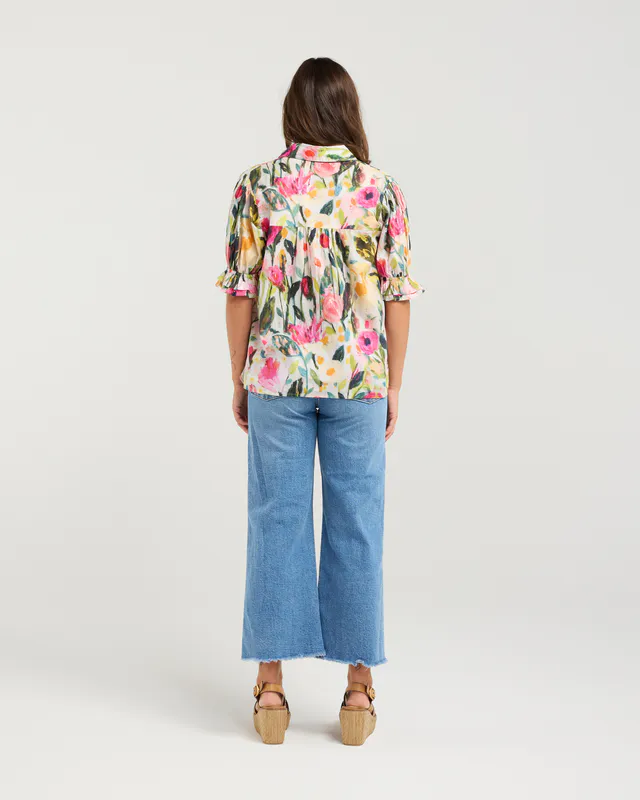 Model wearing Prime Rose Bossa Top By NMBR Rose Available at Beetees Nelson