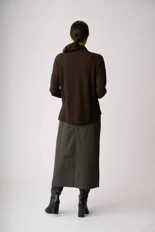 Model wearing Black Reverse Seam Jumper By Foil Available at Beetees Nelson