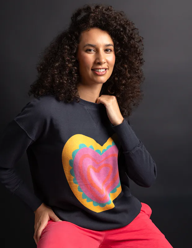 Model wearing Navy Flaming Heart Crew By Elm Available at Beetees Nelson