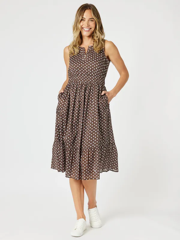 Model wearing Koko White Get Spotty Dress By Gordon Smith Available at Beetees Nelson