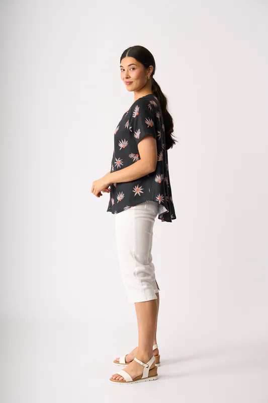 Model wearing In Flower Top - Swing, Up Down Hem By Preen Available at Beetees Nelson