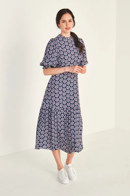 Model wearing Navy Print Susana Dress By Lemon Tree Design Available at Beetees Nelson