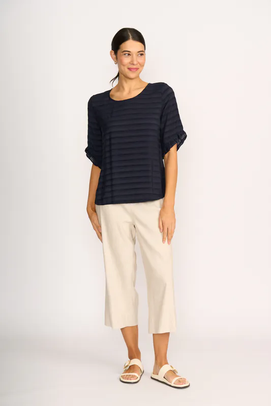 Model wearing Navy Stripe Scoop Ruffle Sleeve Top By Preen Available at Beetees Nelson