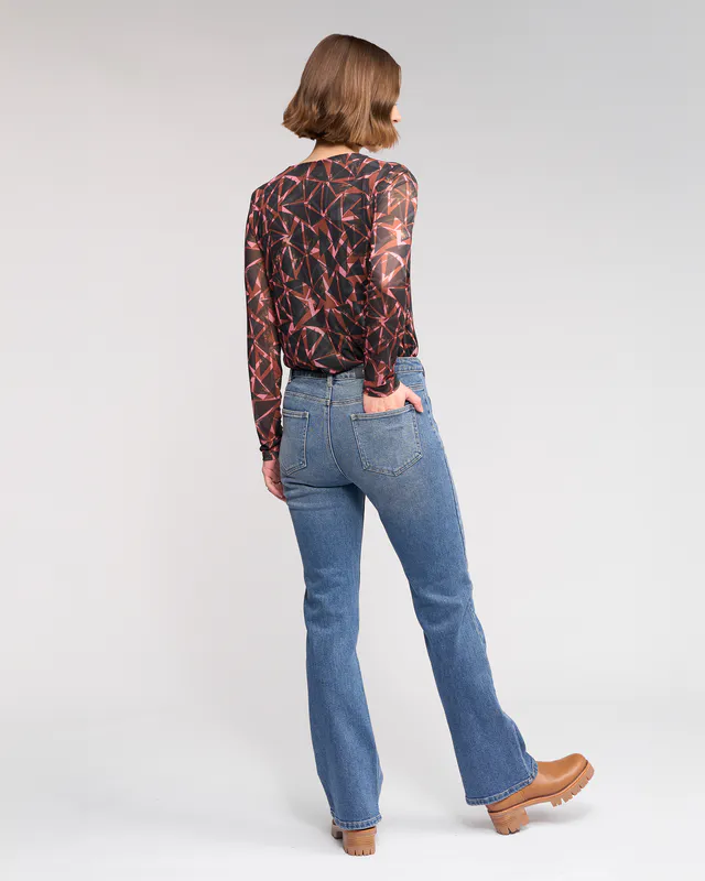 Model wearing Vintage Denim Potter Jean By Knewe Available at Beetees Nelson