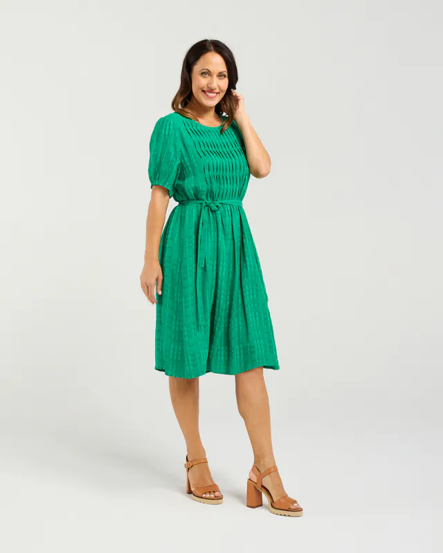 Model wearing Green Joana Dress By Seduce Available at Beetees Nelson
