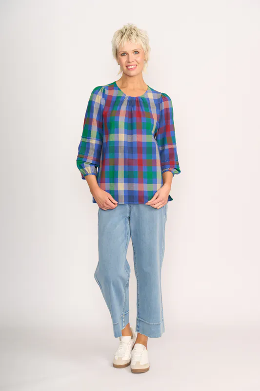 Model wearing Blue Check Top - Pintuck Volume Sleeve By Memo Available at Beetees Nelson