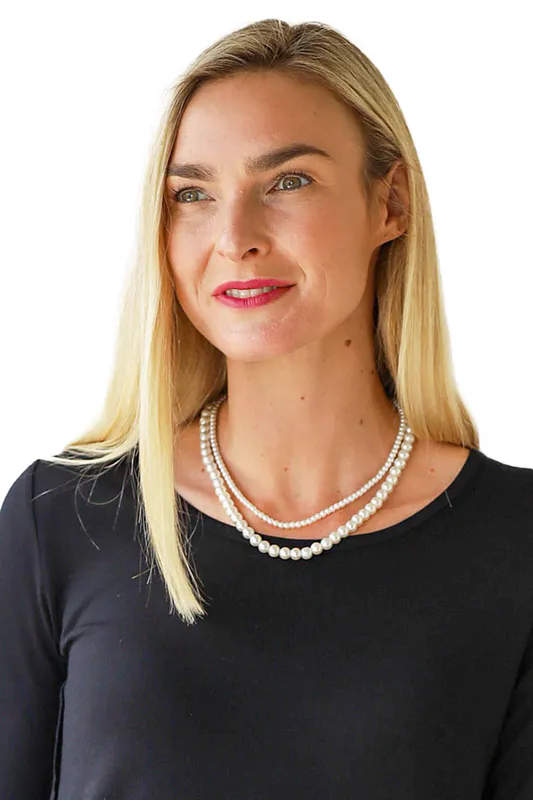Model wearing Double Strand Synthetic Pearl Necklace By Archer House Available at Beetees Nelson