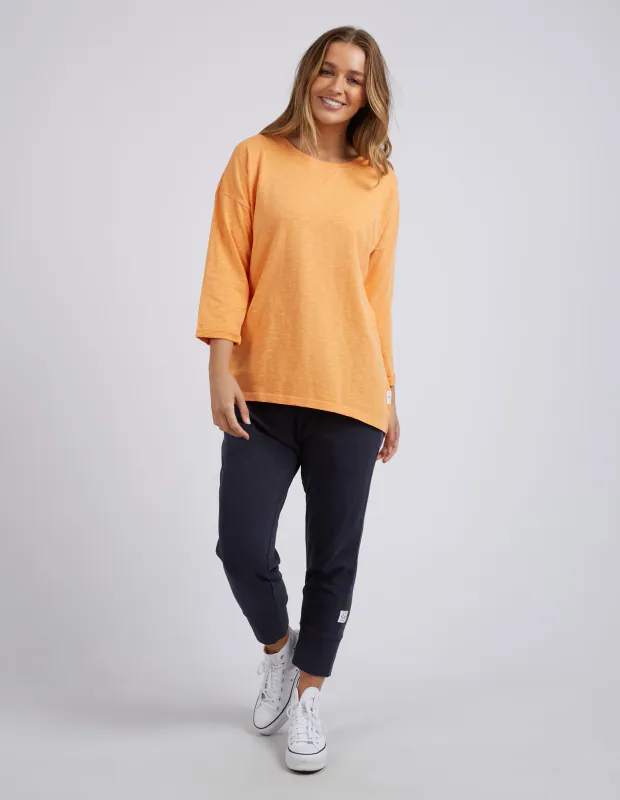 Model wearing Mango Coloured Annie 3/4 Sleeve Tee By Elm Clothing available at Beetees Nelson