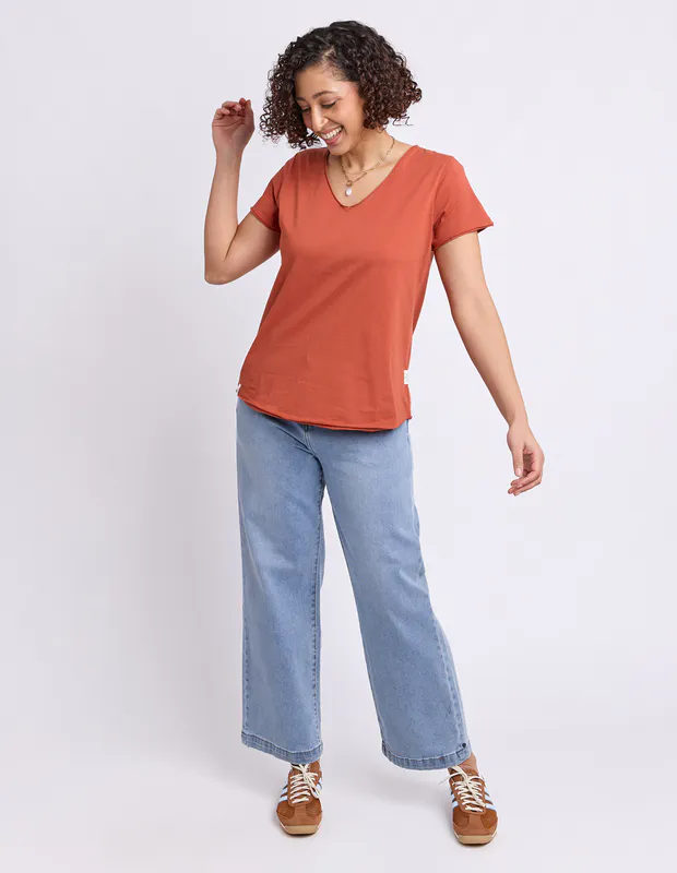 Model wearing Earth Brown Pima Vee Tee By Elm Available at Beetees Nelson