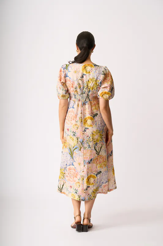 Model wearing Peonies Empire-Ly Yours Dress By Foil Available at Beetees Nelson