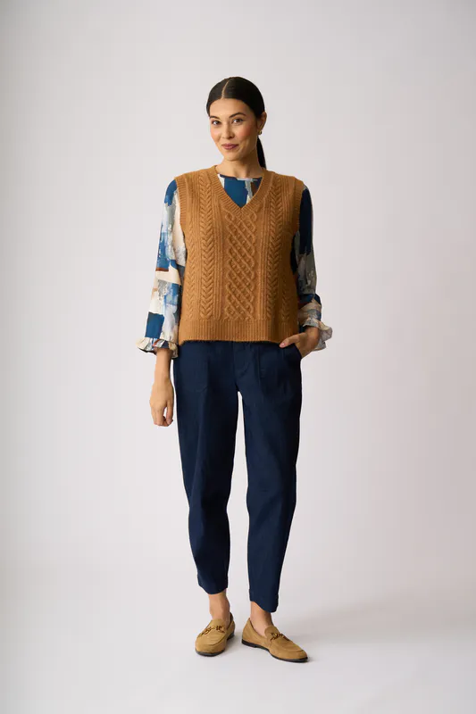 Model wearing Ginger Cable Knit Vest By Memo Available at Beetees Nelson