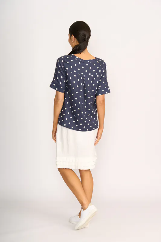 Model wearing Navy Spot Pleat Back Top By Foil Available at Beetees Nelson